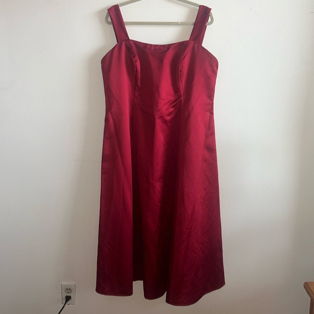 This is a sexy red Alfred Angelo branded dress